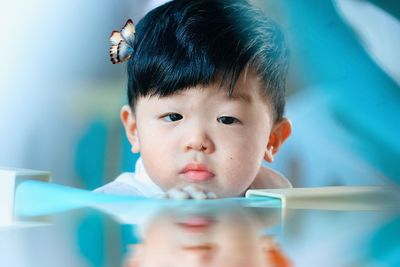 Close-up portrait of cute baby boy