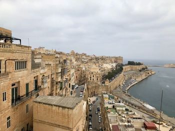 High angle view of buildings against sky