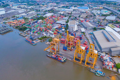 High angle view of boats moored at harbor