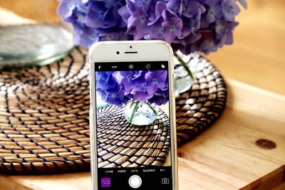 Close-up of mobile phone on table