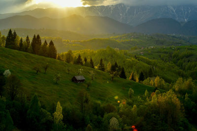 Scenic view of landscape against sky during sunset