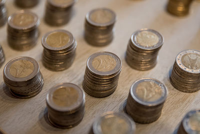 High angle view of coins on table