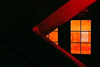 Illuminated building against sky at night