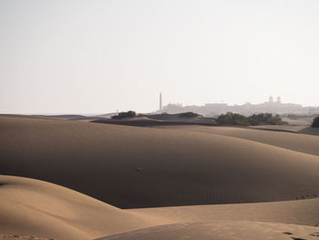 Scenic view of desert against clear sky