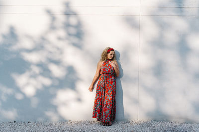 Woman standing against blurred background