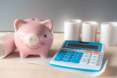 Close-up of piggy bank on table