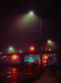 Illuminated road at night