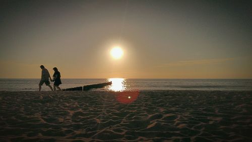 Scenic view of sea at sunset