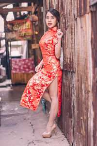 Young woman in traditional clothing outdoors