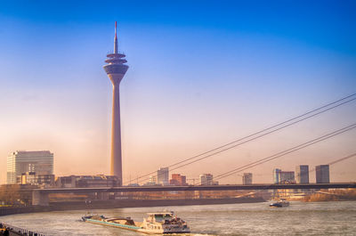 View of communications tower in city