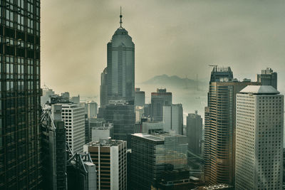 Modern buildings in city against sky