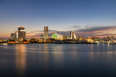 Minato mirai skyline golden glow during the sunset.