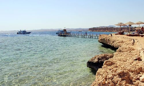 Scenic view of sea against clear sky