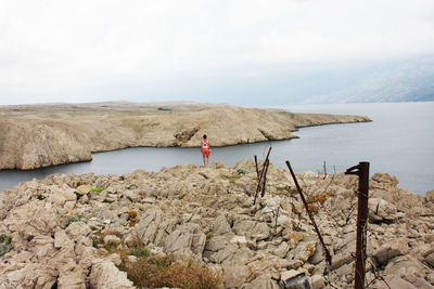 Man standing on rock formation