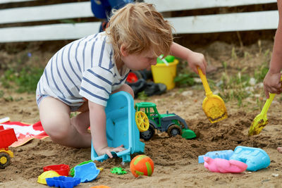 High angle view of boy playing on field