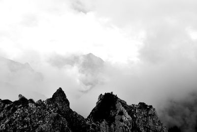 Low angle view of mountains against sky