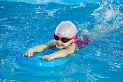 Woman swimming in sea