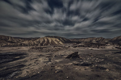 View of landscape against cloudy sky