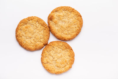 Close-up of cookies against white background