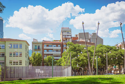 Tenements with sports ground, basketball court and recreational area in a big city. barcelona, spain