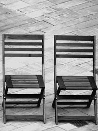 High angle view of empty chairs and tables