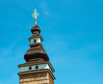 Low angle view of cathedral against blue sky