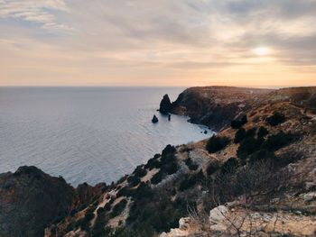 Scenic view of sea against sky during sunset