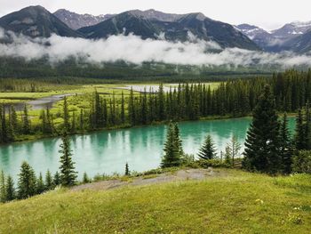 Scenic view of lake by mountains