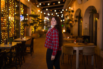 Woman standing in restaurant