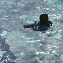 Woman swimming in water