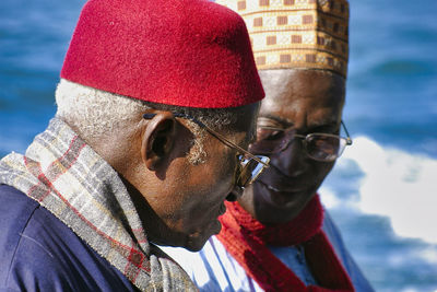 Close-up portrait of man wearing sunglasses