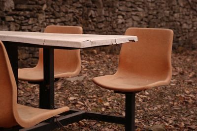 Low section of man relaxing on chair