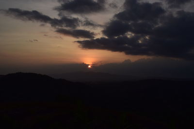 Scenic view of silhouette landscape against sky during sunset
