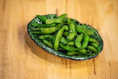 High angle view of green vegetables on table