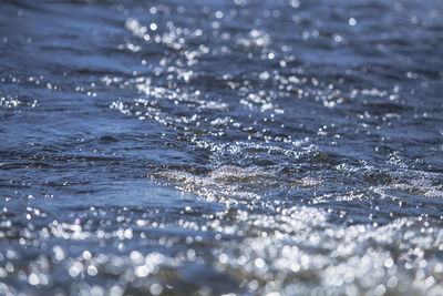 Close-up of sea waves splashing on shore