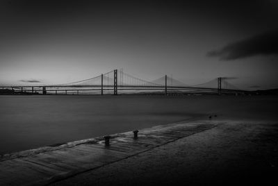 View of suspension bridge at night