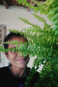 Portrait of boy with plants