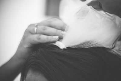 Cropped image of bride wearing veil