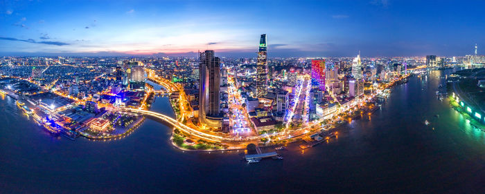 Aerial view of illuminated city at night