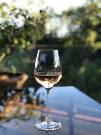 Close-up of wine glass on table