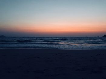 Scenic view of sea against sky at sunset