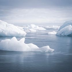 Scenic view of frozen sea against sky