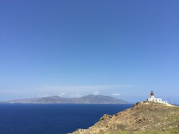 Scenic view of sea against blue sky