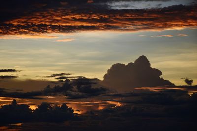 Scenic view of silhouette landscape against sky during sunset