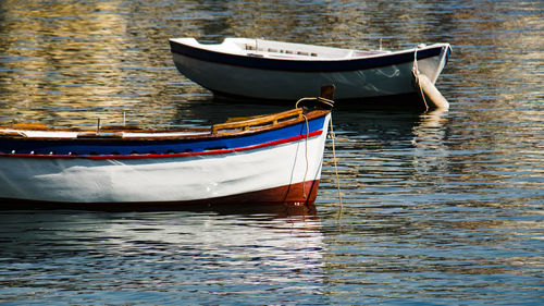 Boat moored in lake