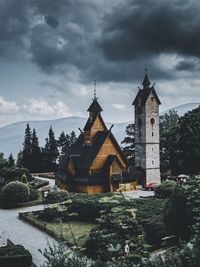 View of buildings against cloudy sky