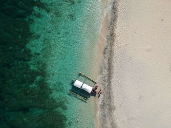 High angle view of ship on sea shore