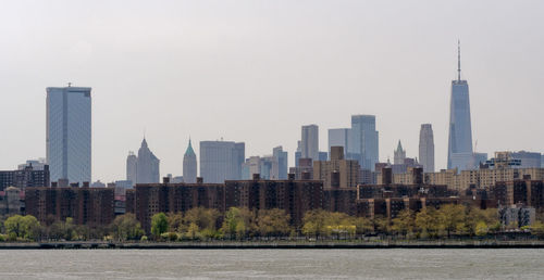 View of buildings in city against sky