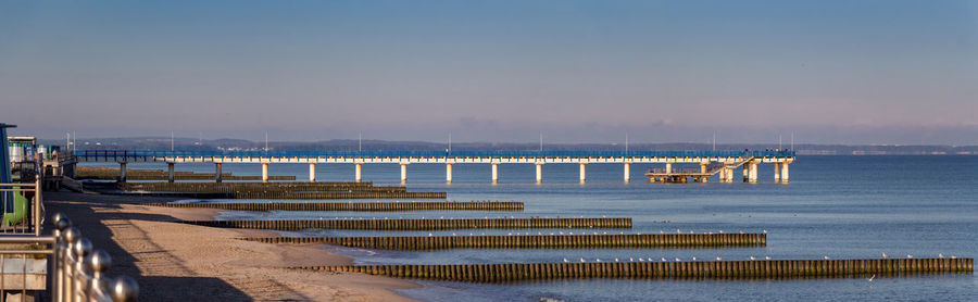 Pier on sea against sky