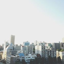 View of cityscape against clear sky